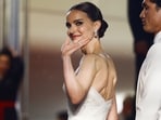 Academy Award-winning actor Natalie Portman walked the Cannes Film Festival 2023 red carpet on May 20 in an embroidered tulle dress from Dior. She kept her makeup minimal, and tied her hair in a neat bun.&nbsp;