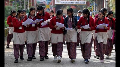 Class 8 students coming out of examination centre at the Government Senior Secondary Smart School at PAU in Ludhiana, on Saturday. (MANISH/HT)