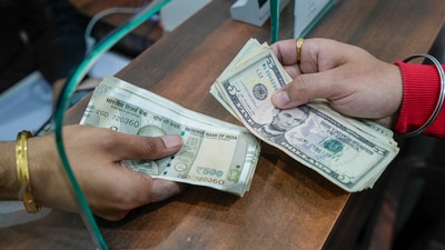A depreciation in the Indian rupee's value was attributed to a shift in policy by the RBI, a report has claimed. (PTI) A depreciation in the Indian rupee's value was attributed to a shift in policy by the RBI, a report has claimed. (PTI)
