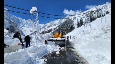 Snow being cleared from a road near the Atal Tunnel in Manali on Saturday. (Aqil Khan /HT)