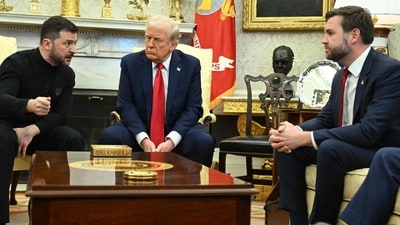 Ukraine's President Volodymyr Zelensky speaks to US Vice President JD Vance as they meet with President Donald Trump in the Oval Office of the White House in Washington, DC, February 28, 2025. (AFP)
