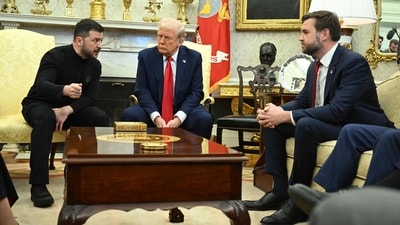 Ukraine's President Volodymyr Zelensky speaks to US Vice President JD Vance as they meet with President Donald Trump in the Oval Office of the White House in Washington, DC, February 28, 2025. (AFP)