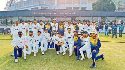 The Punjab team after lifting the prestigious Col CK Nayudu U-23 Trophy at their home ground in Mullanpur on Saturday. (HT Photo) The Punjab team after lifting the prestigious Col CK Nayudu U-23 Trophy at their home ground in Mullanpur on Saturday. (HT Photo)