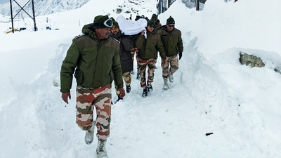 Indo-Tibetan Border Police personnel carry out rescue operations for BRO workers who got trapped under snow following the avalanche that struck on Feb 28, near Mana in Chamoli on Saturday. (ANI) Indo-Tibetan Border Police personnel carry out rescue operations for BRO workers who got trapped under snow following the avalanche that struck on Feb 28, near Mana in Chamoli on Saturday. (ANI)