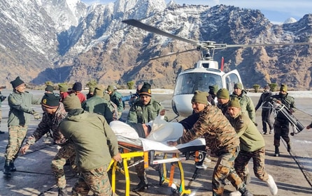 Indian Army rescues workers of the Border Roads Organisation (BRO) who got trapped under snow following the avalanche that struck near Mana village on 28th Feb, in Chamoli on Saturday. (ANI) Indian Army rescues workers of the Border Roads Organisation (BRO) who got trapped under snow following the avalanche that struck near Mana village on 28th Feb, in Chamoli on Saturday. (ANI)