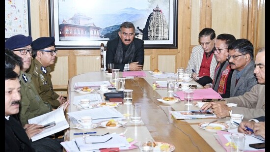 Chief minister Sukhvinder Singh Sukhu chairs a meeting of police and other officials in Shimla on Saturday. (HT photo )
