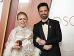 Georgeta Orlovschi, left, and Sebastian Stan arrive at the Oscars on Sunday, March 2, 2025, at the Dolby Theatre in Los Angeles. (Photo by Jordan Strauss/Invision/AP)