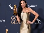 TOPSHOT - US actress Demi Moore poses with the Best Performance by a Female Actor in a Motion Picture � Musical or Comedy award for "The Substance" in the press room during the 82nd annual Golden Globe Awards at the Beverly Hilton hotel in Beverly Hills, California, on January 5, 2025. (Photo by Robyn Beck / AFP)