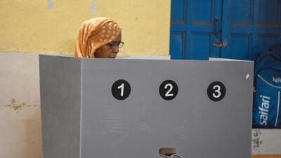 A woman casts her vote at a polling station at the Government Senior Secondary School in Manesar on Sunday. (Parveen Kumar/HT Photo) A woman casts her vote at a polling station at the Government Senior Secondary School in Manesar on Sunday. (Parveen Kumar/HT Photo)