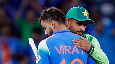 India's Virat Kohli shares a warm hug with Pakistan's Babar Azam. (Surjeet Yadav) India's Virat Kohli shares a warm hug with Pakistan's Babar Azam. (Surjeet Yadav)
