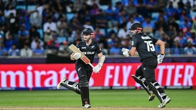 Kane Williamson and Daryl Mitchell were then held in a chokehold by the Indian spinners led by Varun Chakravarthy. Mitchell perished 17 off 35 balls and by that point, the partnership between them had produced 44 runs in 82 balls. (AFP) Kane Williamson and Daryl Mitchell were then held in a chokehold by the Indian spinners led by Varun Chakravarthy. Mitchell perished 17 off 35 balls and by that point, the partnership between them had produced 44 runs in 82 balls. (AFP)