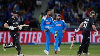 But the night belonged to Varun Chakravarthy. He took two wickets in what turned out to be his last over. The second of those was that of Matt Henry, who had himself taken five wickets earlier and he ended up becoming Chakravarthy's fifth strike himself. (AP) But the night belonged to Varun Chakravarthy. He took two wickets in what turned out to be his last over. The second of those was that of Matt Henry, who had himself taken five wickets earlier and he ended up becoming Chakravarthy's fifth strike himself. (AP)