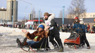 Riley Dyche (17), of Big Lake, Alaska, turns the corner onto Cordova Street during the Ceremonial Start of the Iditarod Trail Sled Dog Race in Anchorage, Alaska., Saturday, March 1, 2025. (AP) Riley Dyche (17), of Big Lake, Alaska, turns the corner onto Cordova Street during the Ceremonial Start of the Iditarod Trail Sled Dog Race in Anchorage, Alaska., Saturday, March 1, 2025. (AP)