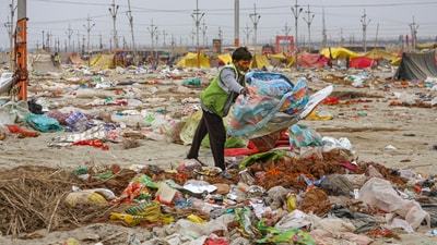After workers collect the garbage from the grounds, it will be systematically processed and disposed of at the Baswar plant in Naini. (PTI) After workers collect the garbage from the grounds, it will be systematically processed and disposed of at the Baswar plant in Naini. (PTI)