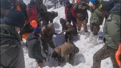 The rescue teams searching for missing workers in the deep snow at the avalanche-hit site near Mana in Uttarakhand’s Chamoli district.