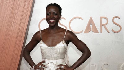 Lupita Nyong'o arrives at the Oscars on Sunday. (Jordan Strauss/Invision/AP) Lupita Nyong'o arrives at the Oscars on Sunday. (Jordan Strauss/Invision/AP)