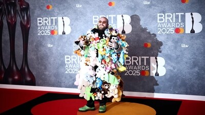 US singer Teddy Swims served a quirky look with plushies and soft toys as the stars of his ensemble. (AFP) US singer Teddy Swims served a quirky look with plushies and soft toys as the stars of his ensemble. (AFP)