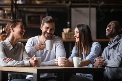 Meeting at local cafes instead of formal boardrooms makes a work trip more enriching. (Shutterstock)
