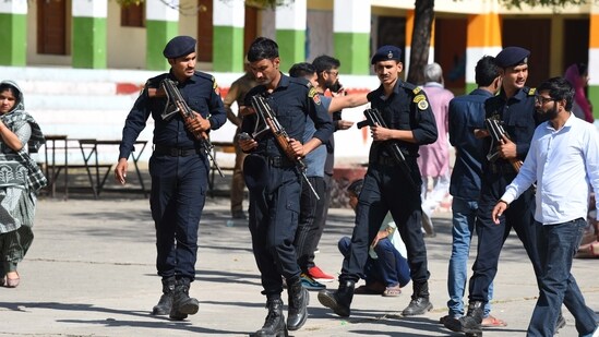 Haryana police commando deployed during the Gurugram Civic Body Elections at Government Senior Secondary School in Nathupur village near DLF phase-3, in Gurugram, India, on Sunday, 02 March 2025. (Parveen Kumar/Hindustan Times)
