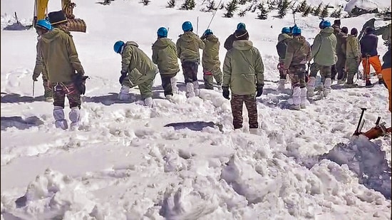 Rescue operation underway after an avalanche hit the Border Roads Organisation (BRO) camp between Mana and Badrinath on Friday, in Chamoli district in Uttarakhand. (PTI)