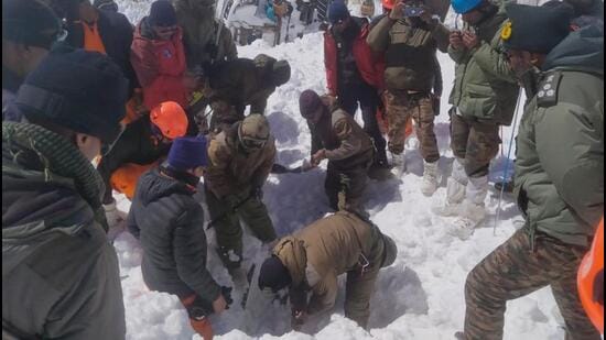 The rescue teams searching for missing workers in the deep snow at the avalanche-hit site near Mana in Uttarakhand’s Chamoli district.
