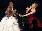 Cynthia Erivo, left, and Ariana Grande perform "Defying Gravity" during the Oscars on Sunday, March 2, 2025, at the Dolby Theatre in Los Angeles. (AP Photo/Chris Pizzello)
