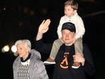 Elon Musk, right, his son X and his mother Maye Musk walk across the South Lawn of the White House after arriving with President Donald Trump on Marine One, Sunday, March 2, 2025
