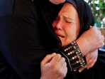 A mourner reacts during the funeral of two Palestinians killed by Israeli fire in Rafah, amid impasse over ceasefire deal, at Nasser hospital in Khan Younis, in the southern Gaza Strip, March 3, 2025. 