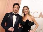 Adrien Brody and Georgina Chapman attends the 97th Annual Oscars at Dolby Theatre on March 02, 2025 in Hollywood, California.   