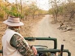 Prime Minister Narendra Modi looks at the Asiatic Lions at Gir National Park and Wildlife Sanctuary during his visit on World Wildlife Day, on Monday. 