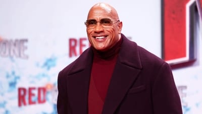 Dwayne Johnson poses for photographers at an event for the film Red One in 2024. Dwayne Johnson poses for photographers at an event for the film Red One in 2024.