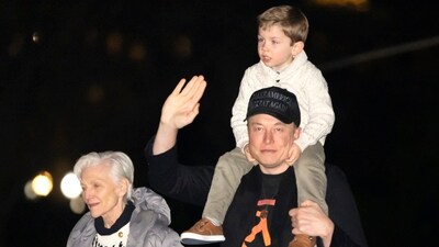Elon Musk, right, his son X and his mother Maye Musk walk across the South Lawn of the White House after arriving with President Donald Trump on Marine One, Sunday, March 2, 2025 (AP) Elon Musk, right, his son X and his mother Maye Musk walk across the South Lawn of the White House after arriving with President Donald Trump on Marine One, Sunday, March 2, 2025 (AP)