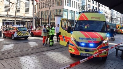 Emergency services and police stand at Paradeplatz in Mannheim, Germany, after a serious incident on Monday. (AP) Emergency services and police stand at Paradeplatz in Mannheim, Germany, after a serious incident on Monday. (AP)