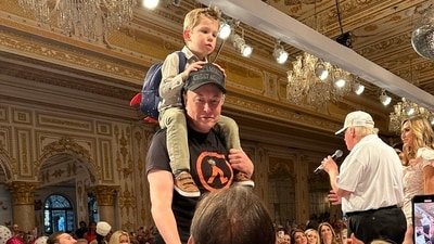 Elon Musk with son Lil X at a Mar-a-Lago event. (X/@iam_smx) Elon Musk with son Lil X at a Mar-a-Lago event. (X/@iam_smx)
