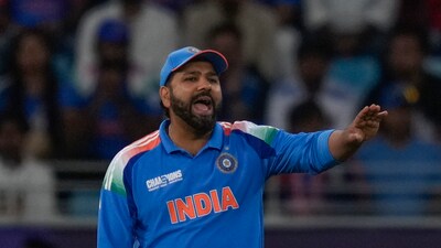 India's captain Rohit Sharma during the ICC Champions Trophy cricket match between India and New Zealand at Dubai International Cricket Stadium in Dubai. (AP) India's captain Rohit Sharma during the ICC Champions Trophy cricket match between India and New Zealand at Dubai International Cricket Stadium in Dubai. (AP)