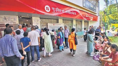 Thane, India - February 17, 2025: Third Day ,After the RBI imposed restrictions on New India Co-op Bank LTD,, Third day account holders had gathered outside the vasant Vihaar Thane branch of New India Co-op Bank Ltd to remove their valuables documents and gold from the bank's lockers on Monday, the Third day ,in Thane,in Mumbai, India, on, Monday, February -17, 2024. ( Praful Gangurde /HT Photo ) Thane, India - February 17, 2025: Third Day ,After the RBI imposed restrictions on New India Co-op Bank LTD,, Third day account holders had gathered outside the vasant Vihaar Thane branch of New India Co-op Bank Ltd to remove their valuables documents and gold from the bank's lockers on Monday, the Third day ,in Thane,in Mumbai, India, on, Monday, February -17, 2024. ( Praful Gangurde /HT Photo )