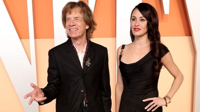 BEVERLY HILLS, CALIFORNIA - MARCH 02: (L-R) Mick Jagger and Melanie Hamrick attend the 2025 Vanity Fair Oscar Party Hosted By Radhika Jones at Wallis Annenberg Center for the Performing Arts on March 02, 2025 in Beverly Hills, California. Amy Sussman/Getty Images/AFP (Photo by Amy Sussman / GETTY IMAGES NORTH AMERICA / Getty Images via AFP) (Getty Images via AFP) BEVERLY HILLS, CALIFORNIA - MARCH 02: (L-R) Mick Jagger and Melanie Hamrick attend the 2025 Vanity Fair Oscar Party Hosted By Radhika Jones at Wallis Annenberg Center for the Performing Arts on March 02, 2025 in Beverly Hills, California. Amy Sussman/Getty Images/AFP (Photo by Amy Sussman / GETTY IMAGES NORTH AMERICA / Getty Images via AFP) (Getty Images via AFP)
