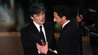 Cillian Murphy congratulated Adrien Brody, the Best Actor winner at the Oscars 2025, with a whispered compliment. ((Photo by Patrick T. Fallon / AFP))