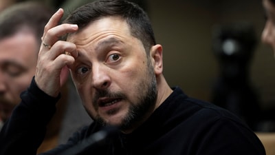Ukrainian President Volodymyr Zelensky gestures during a meeting with members of the media on the outskirts of  London, Britain. (REUTERS)