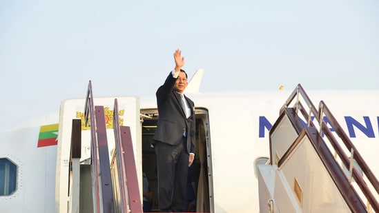 In this image provided by The Myanmar Military True News Information Team, Myanmar's military leader Senior Gen. Min Aung Hlaing waves as he departs from Naypyidaw international airport, Myanmar to Russia Monday, March 3, 2025. (The Myanmar Military True News Information Team via AP) (AP)