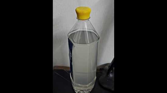 The contaminated water inside the bottle shared by a resident. (Sourced)