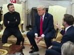 Vice President JD Vance, right, speaks with Ukrainian President Volodymyr Zelenskyy, left, as President Donald Trump listens in the Oval Office at the White House, Friday, Feb. 28, 2025, in Washington.