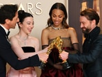 Mikey Madison, winner of the Oscar for Best Actress for Anora, Adrien Brody, winner of the Oscar for Best Actor for The Brutalist,  Zoe Saldana, winner of the Oscar for Best Supporting Actress for Emilia Perez, and Kieran Culkin, winner of the Oscar for Best Supporting Actor for A Real Pain, pose in the Oscars photo room at the 97th Academy Awards in Hollywood, Los Angeles, California, U.S., March 2, 2025. REUTERS/Daniel Cole