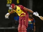 Kieron Pollard celebrates after hitting six sixes in an over during a T20I match against Sri Lanka in Antigua.