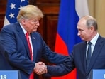 US President Donald Trump (L) and Russia's President Vladimir Putin shake hands before attending a joint press conference. (File image)
