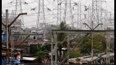 FILE PHOTO: A suburban passenger train goes past high-voltage electricity towers in Mumbai June 20, 2008. REUTERS/Arko Datta (REUTERS) FILE PHOTO: A suburban passenger train goes past high-voltage electricity towers in Mumbai June 20, 2008. REUTERS/Arko Datta (REUTERS)