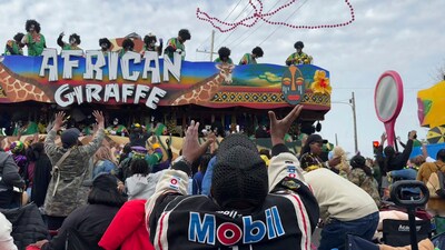 Spectators vie to catch prizes known as throws during the Krewe of Zulu parade on Mardi Gras Day in New Orleans, Tuesday, March 4, 2025. (AP Photo/Jack Brook) (AP) Spectators vie to catch prizes known as throws during the Krewe of Zulu parade on Mardi Gras Day in New Orleans, Tuesday, March 4, 2025. (AP Photo/Jack Brook) (AP)
