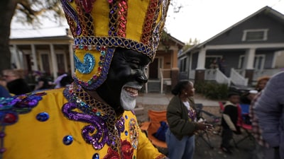 A member of the Zulu Tramps walks down Jackson Ave before the start of the Mardi Gras Day parade on Tuesday, March 4, 2025 in New Orleans. (AP Photo/Gerald Herbert) (AP) A member of the Zulu Tramps walks down Jackson Ave before the start of the Mardi Gras Day parade on Tuesday, March 4, 2025 in New Orleans. (AP Photo/Gerald Herbert) (AP)