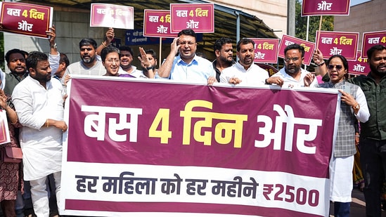 LoP in Delhi Assembly Atishi along with Aam Aadmi Party (AAP) supporters demonstrated demanding the first instalment of ₹2,500/month to the women of Delhi on 8 March, in New Delhi on Monday. (ANI )