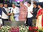 Karnataka Chief Minister Siddaramaiah, Deputy Chief Minister D.K. Shivakumar, actors Shiva Rajkumar, Priyanka Mohan and Umashree during the inauguration of the 16th edition of the Bengaluru International Film Festival.